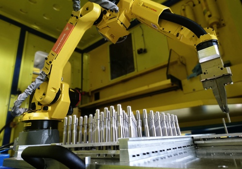 Sriegiklių pakrovimo į stakles robotas